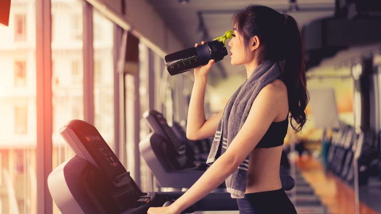 Woman walking on a treadmill