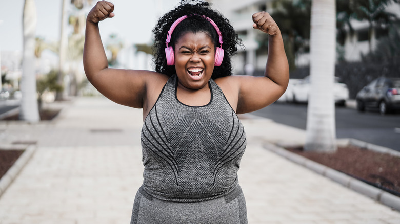 Woman flexing her muscles