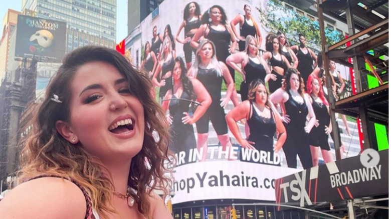 marielle greguski with billboard in times square