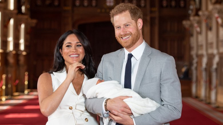 Meghan and Harry laughing during interview