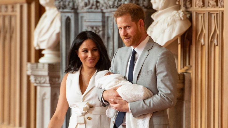 Meghan and Harry stepping into Windsor Castle with baby