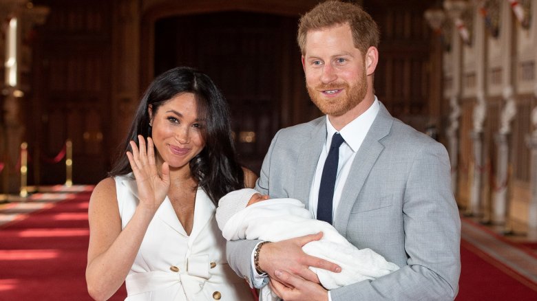 Meghan waving while introducing son with Harry