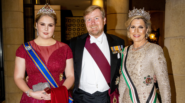 Princess Catharina-Amalia with parents in regalia