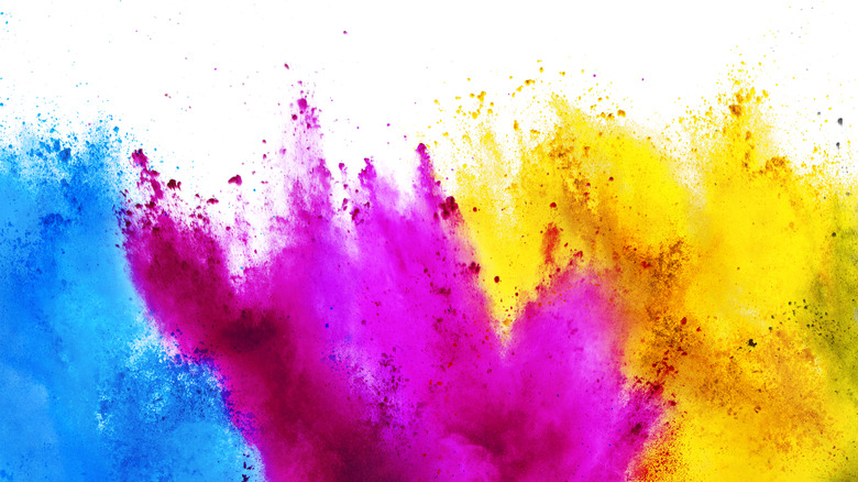 watercolor paint splashed in multiple colors 