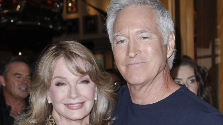 Deidre Hall and Drake Hogestyn smile for the camera. 