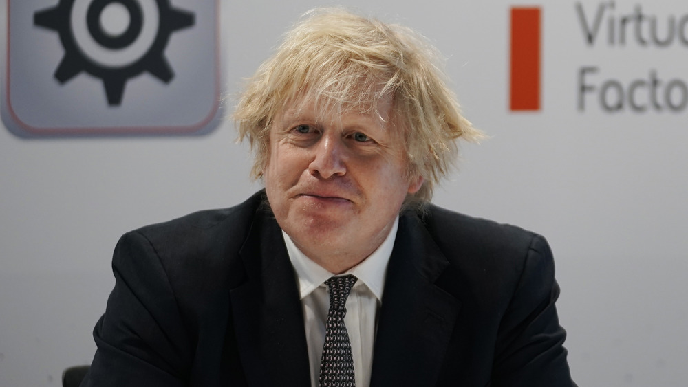 Boris Johnson smirking