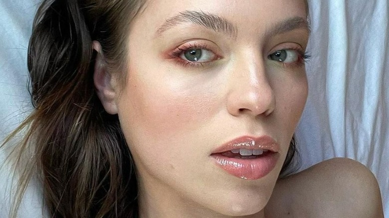 Claudia Sulewski wearing lip gloss