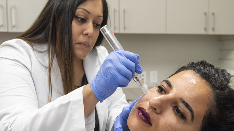 Woman receiving hyaluronic acid injection