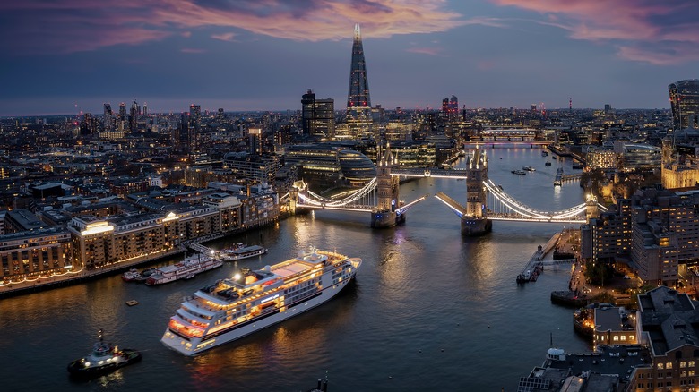 River cruise sailing through London at night