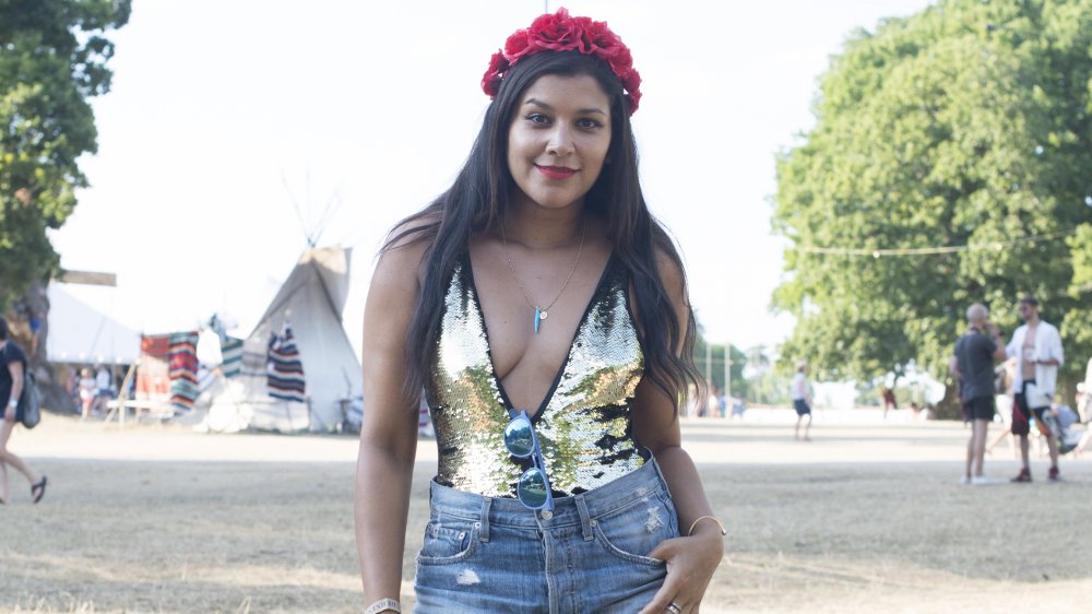 A style blogger wearing an ASOS bodysuit