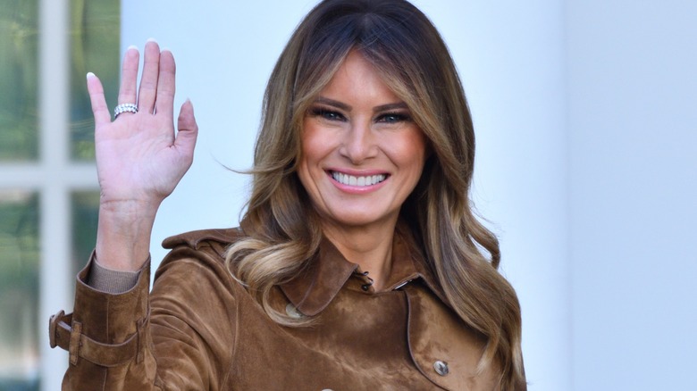 Melania Trump smiling, waving