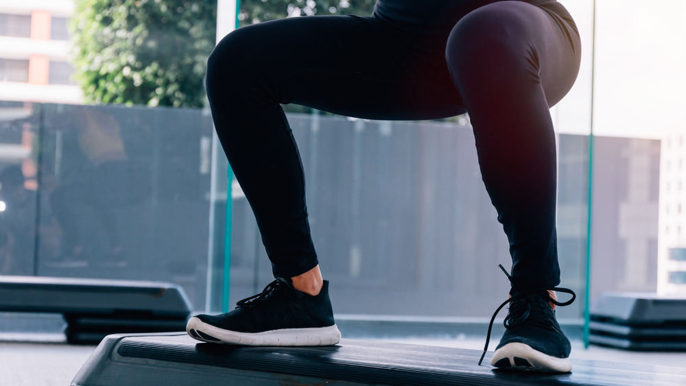 Woman doing deep squats