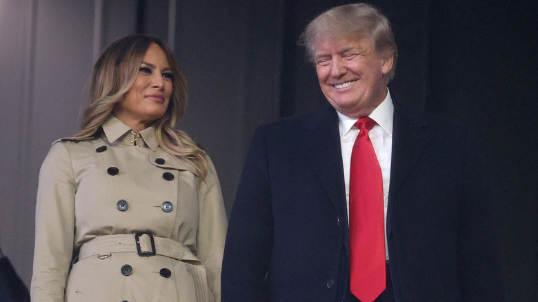 Melania Trump and Donald Trump standing together at World Series