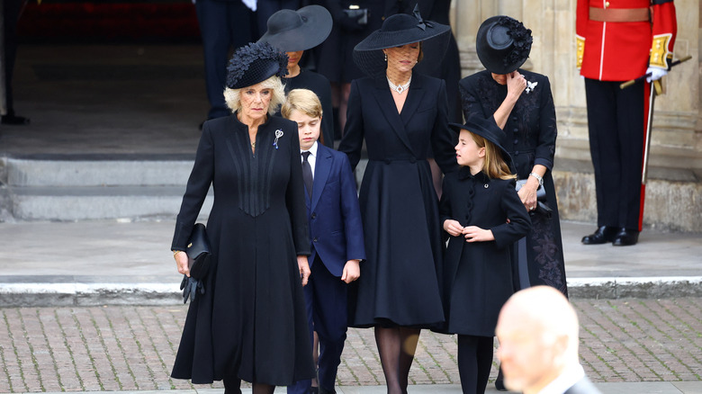 Kate walking with Camilla, Meghan and kids 