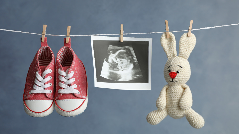 baby items on a clothesline 