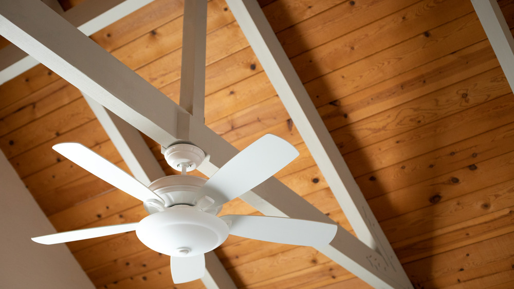 Exposed beam ceiling and a fan 