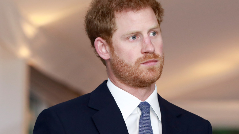 Prince Harry appears at event.