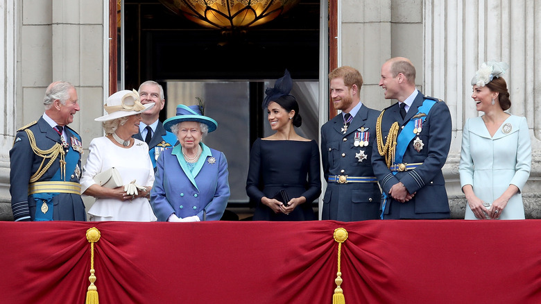 Prince Harry and Meghan Markle with the royal family 