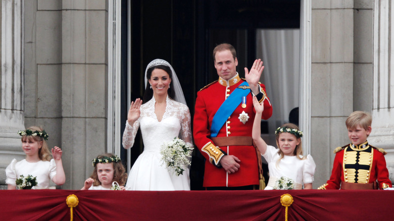 Kate Middleton and Prince William waving