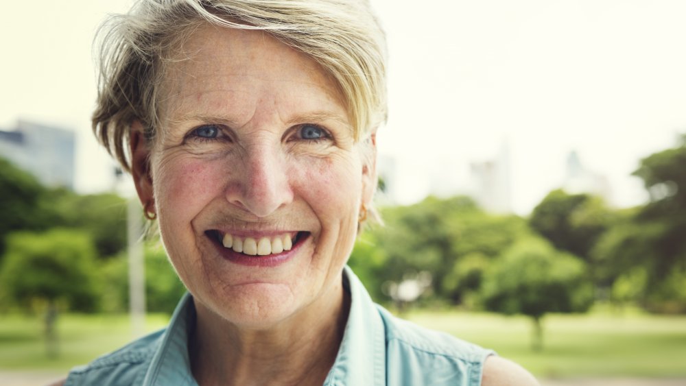 Older woman with lighter eyebrows