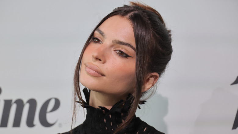 Emily Ratajkowski nude lips and black high-neck dress