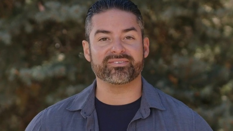 Rico León speaking to camera