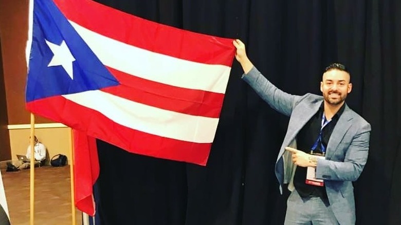 Rico León with Puerto Rican flag