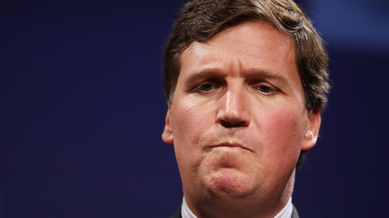 Tucker Carlson frowning 