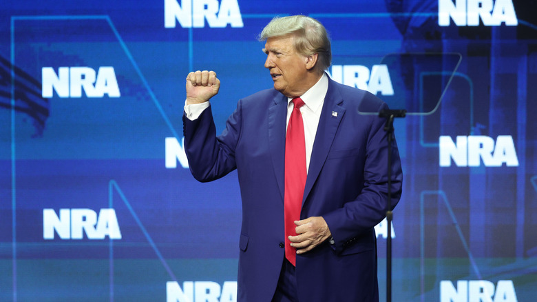 Donald Trump making fist at NRA convention