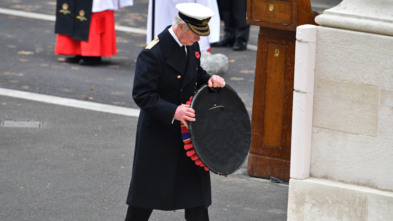 King Charles laying wreath