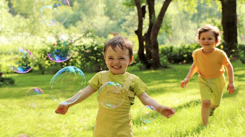 toddlers playing outdoors