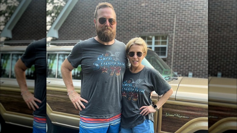 Ben and Erin Napier smiling and wearing sunglasses