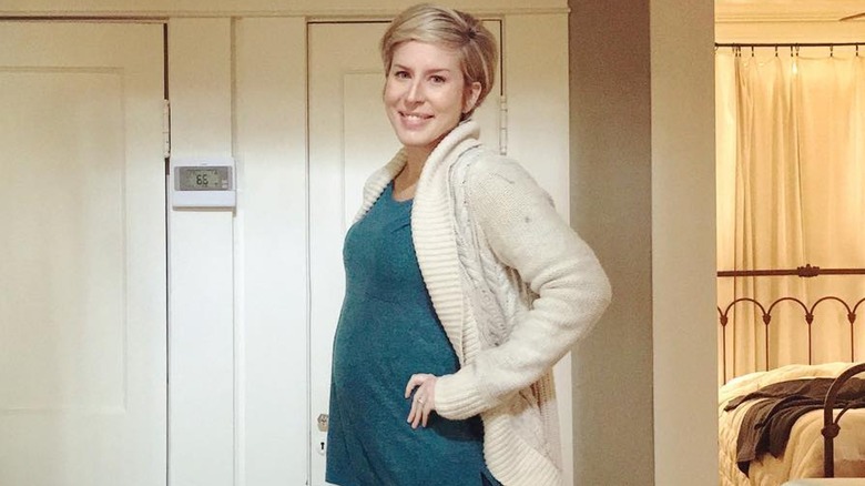 Erin Napier smiling while pregnant