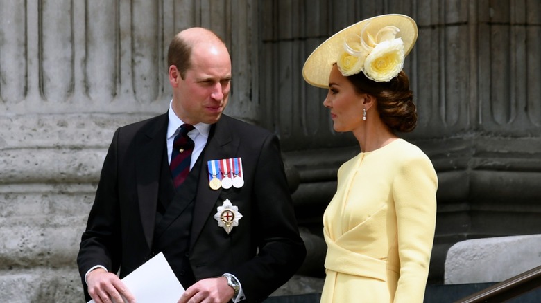 Prince William talking to Kate Middleton