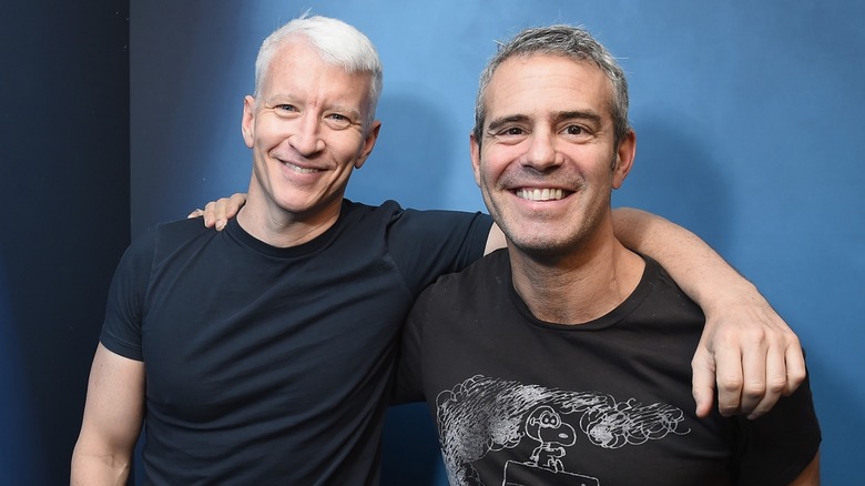 Andy Cohen and Anderson Cooper smiling