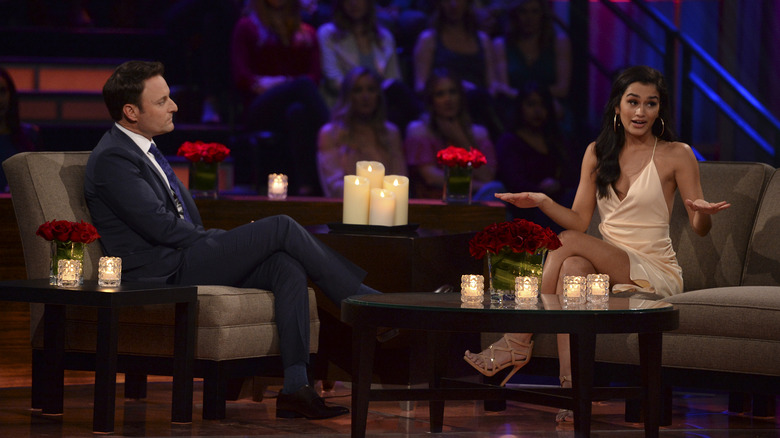 Bachelor franchise host Chris Harrison speaks with Taylor Nolan at Women Tell All