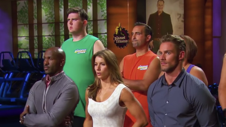 Contestants and trainers on the Biggest Loser