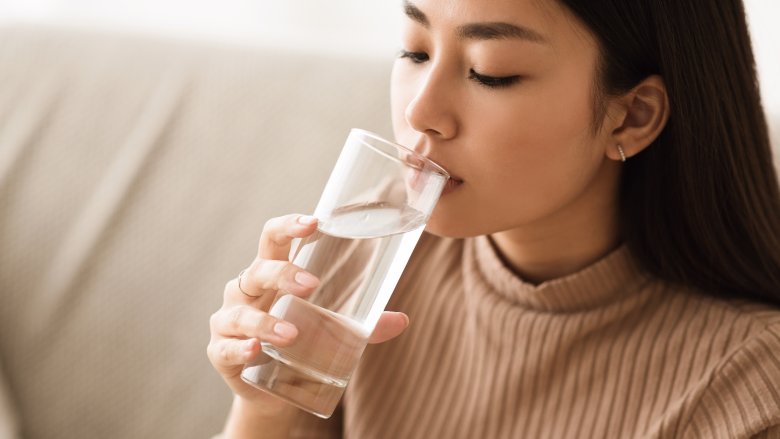 A woman drinking water