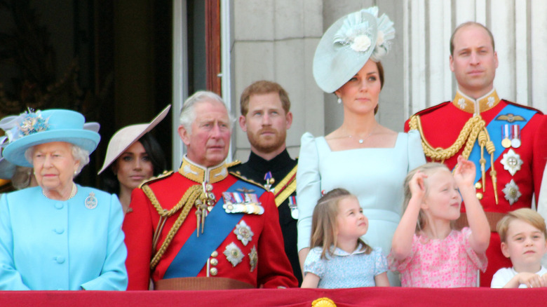 Meghan Markle and the royal family posing 