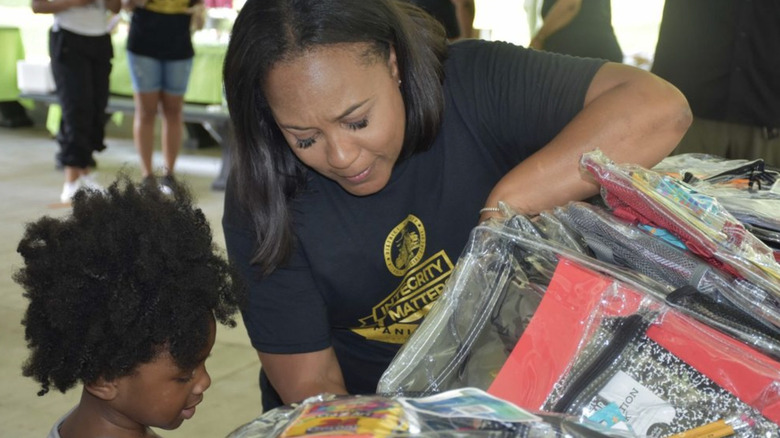 Fani Willis distributing school supplies