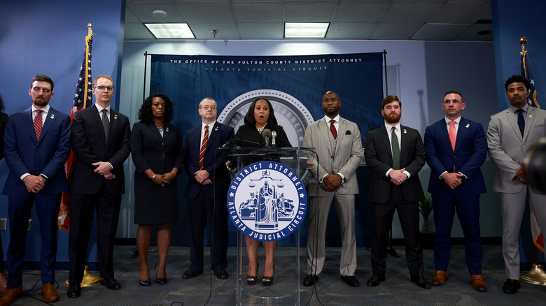 Fani Willis and colleagues at podium