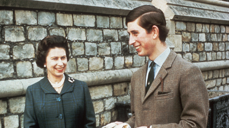 Queen Elizabeth and Prince Charles smiling 1969