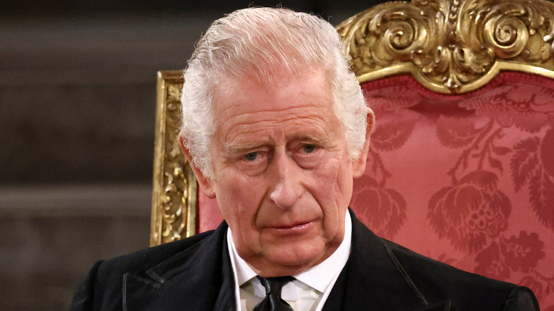 King Charles III sitting