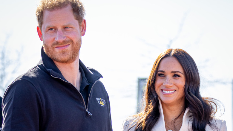 Prince Harry and Meghan Markle smiling