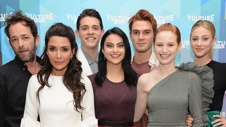 Luke Perry, Marisol Nichols, Casey Cott, Camila Mendes, KJ Apa, Madeline Petsch, Lili Reinhart smiling