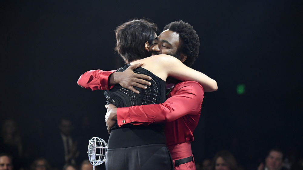 Phoebe Waller-Bridge and Donald Glover hugging