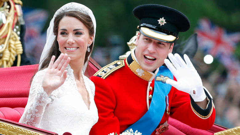 Prince William and Kate Middleton in carriage after wedding