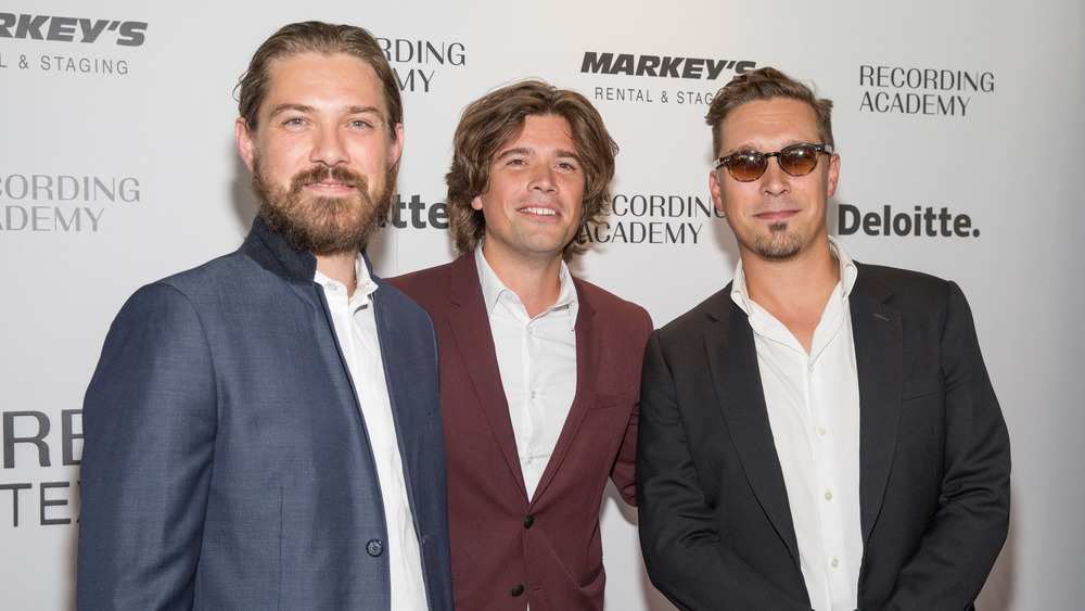 Hanson brothers posing at event