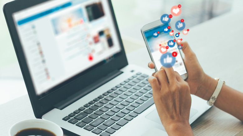 Woman scrolls social media