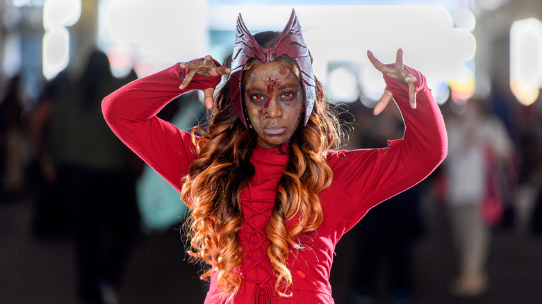 A cosplayer dressed as Wanda Maximoff 